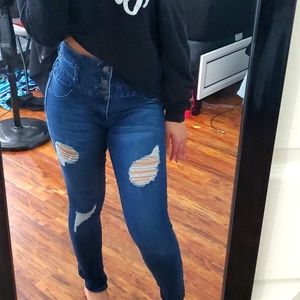 High waisted distressed jeans